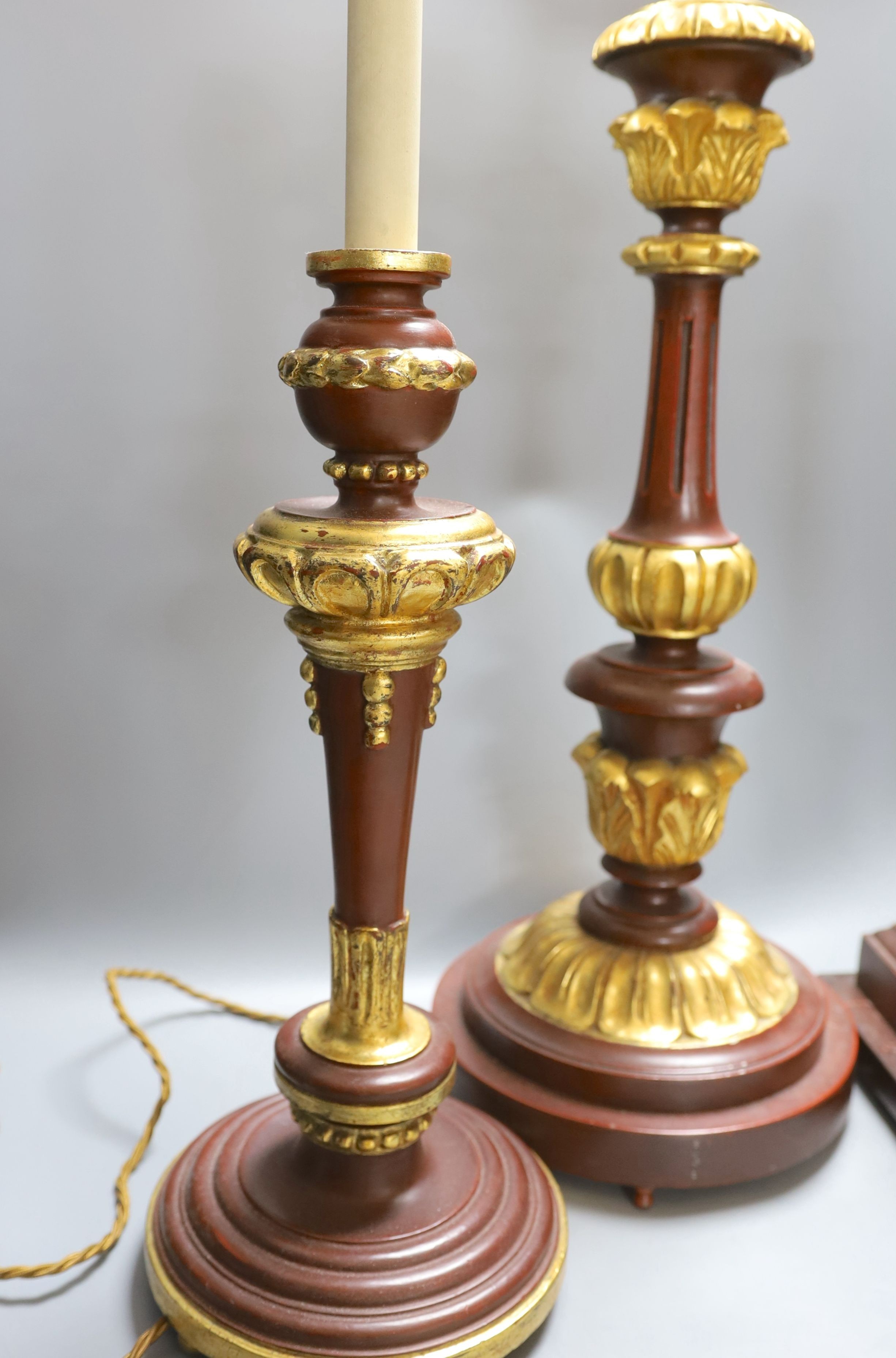 Three parcel gilt wood table lamps - tallest 64cm